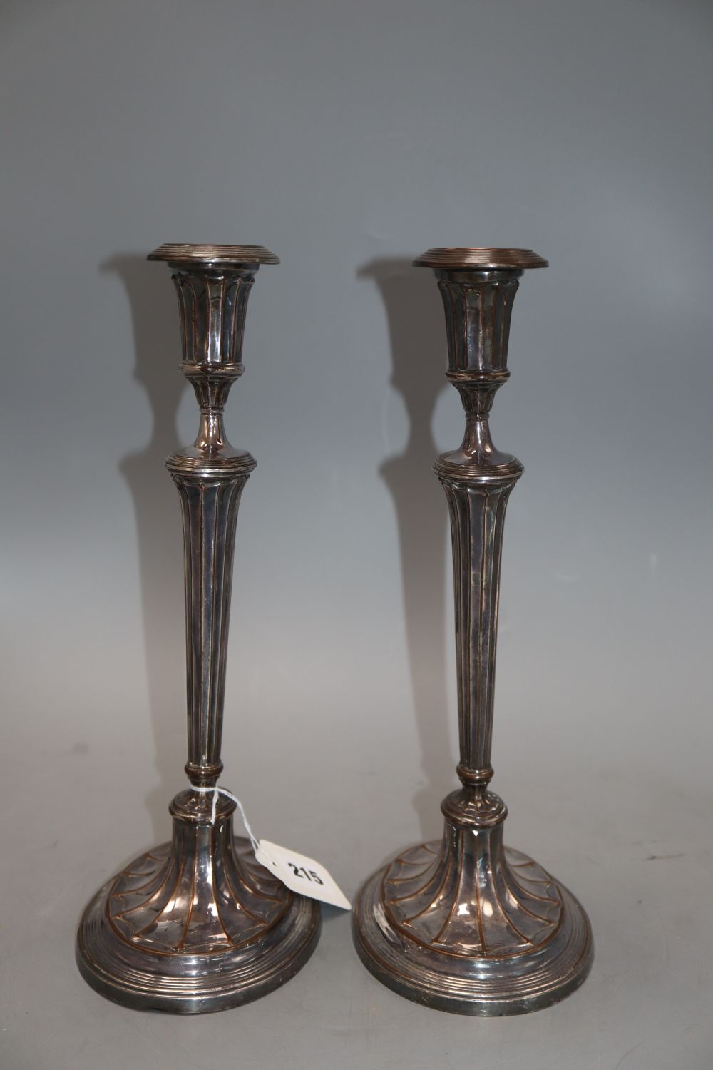 A pair of late 19th / early 20th century Old Sheffield plate candlesticks, height 31cm